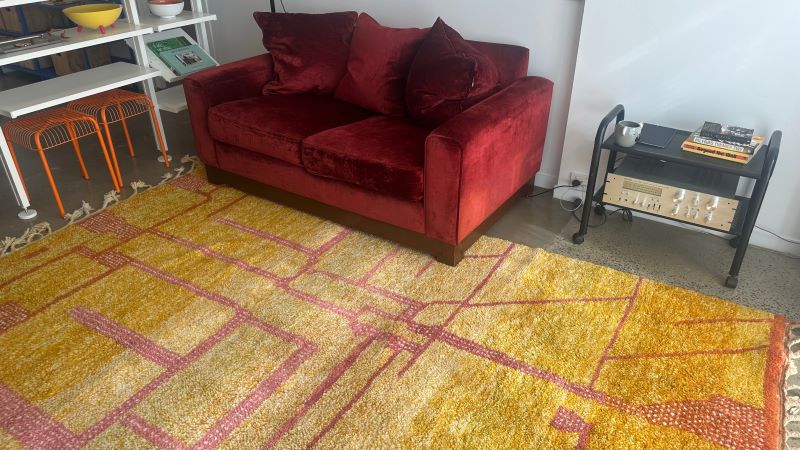 Stop rugs from slipping on hard floors by placing your sofa on the rug to anchor it.